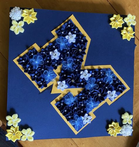 Graduation Cap College Logo, Michigan Grad Cap, Umich Grad Cap, Uconn Grad Cap, University Of Michigan Graduation Party, Navy Blue Grad Cap Ideas, University Of Michigan Graduation, Graduation Cap Diy, Blue Graduation Cap