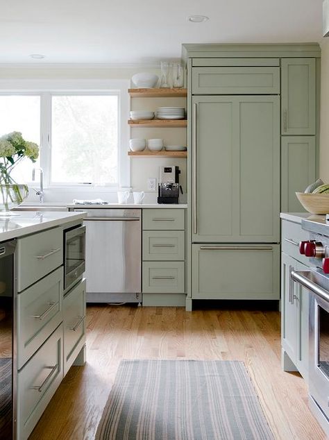 Beautiful kitchen features sage green cabinets paired with white quartz countertops. Green Kitchen Island, Sage Kitchen, Model Dapur, White Countertop, Sage Green Kitchen, Kitchen Transitional, Green Kitchen Cabinets, Kabinet Dapur, Cabinets White