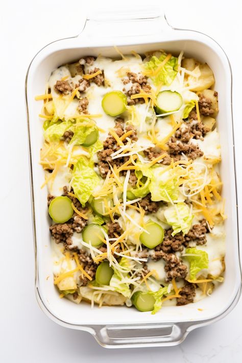 Easy Keto Big Mac Casserole Recipe: Enjoy Fast Food Flavors Guilt-Free #ketodiet #ketorecipes #lowcarb Whole 30 Big Mac Casserole, Keto Burger Casserole, Tasty Freedom Cookbook Recipes, Keto Big Mac Bowl, Keto Big Mac Casserole Recipes, Low Carb Big Mac Casserole, Low Carb Cauliflower Mac And Cheese, Big Mac Casserole Keto, Big Mac Lasagna