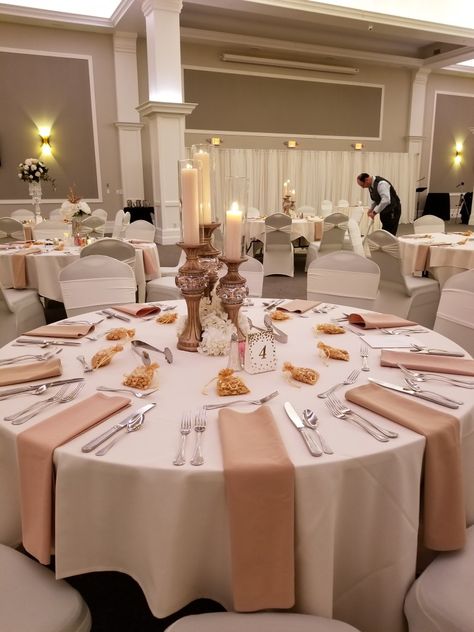 Champagne Gold Tables, Wedding Reception Candle Centerpieces, Taupe Wedding Reception Decor, Champagne Gold Table Display, Gold Napkins Wedding Table Settings, Wedding Reception Champagne Color, Reception Candle Centerpieces, Beige Reception Set, Wedding Reception Centerpieces Candles