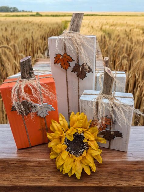 Add charm to your home decor with these rustic blocky pumpkins. Make from wood and hand painted these are the perfect way to elevate your fall decor. Diy Fall Decorations Dollar Store, Thanksgiving Wood Crafts, Block Pumpkins, Fall Crafting, Fall Board, Tea Crafts, Wood Centerpieces, Booth Displays, Thanksgiving Decorations Diy