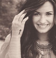 Cross tattoo--demi lovato ❤ Cross Hand Tattoo, Demi Lovato Tattoos, Cross Tattoo On Hand, Tattoo Side, Cross Tattoo On Wrist, Small Cross Tattoos, Cross Tattoos For Women, Hand Tattoos For Women, Wings Tattoo