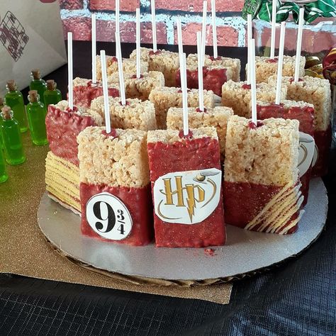 Had rice krispie bars personalized for my daughter Harry potter Birthday theme w the 9 3/4 and HP logo Harry Potter Rice Crispy Treats, Harry Potter Chocolate Covered Pretzels, Harry Potter Treat Trolly, Harry Potter Treat Table, Harry Potter Rice Krispie Treats, Harry Potter Gender Reveal Decorations, Harry Potter Candy Table, Harry Potter Dessert Table, Harry Potter Shower Ideas