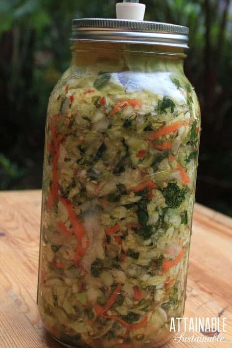 This easy kimchi recipe is spicy and crunchy and salty - it's a great side dish to go with meat and fish when you don't have time to make a salad. Making kimchi is easy. This (vegan) kimchi recipe calls for lots of slicing and dicing, but that's really all it entails. Once chopped, it's just a matter of fermenting the vegetables. #fermenting #preservation #recipe Spicy Kimchi Recipe, Easy Kimchi Recipe, Kimchee Recipe, Vegan Kimchi Recipe, Kimchi Recipes, Making Kimchi, Fermented Vegetables Recipes, Easy Kimchi, Pickled Foods