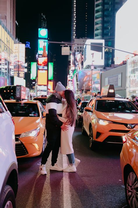 Miriam + Ruben engagement photoshoot in the middle of Times Sq in NYC! | Engagement and couple photography in New York City by Leyre Cañizares Photography Cute Couple Pics New York, Nyc Winter Couple Photos, Nyc Photoshoot Ideas Couple, Couple In New York Aesthetic, Nyc Couple Pictures, New York Couple Pictures, New York Couple Aesthetic, Couples Nyc, Nyc Photoshoot Ideas