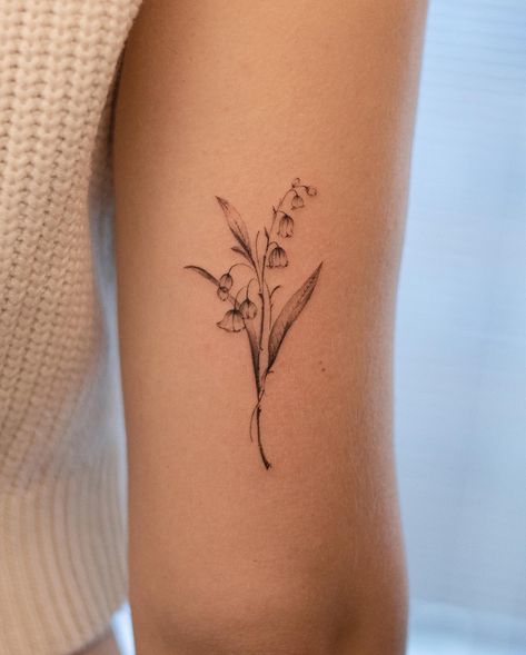 Tattoos With No Flowers, Simple Nature Tattoo Ideas, Butterfly Tattoo On Flower, Small Cute Tattoos With Meaning, Mountain Laurel Flower Tattoo, Lily Of The Valley Tattoo Shoulder, Lily Of The Valley Rib Tattoo, Fineline Wildflower Tattoo, Cowslip Tattoo