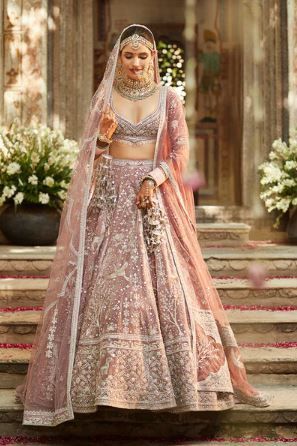 Matsya World is a one-stop destination for all your wedding shopping needs. The online store has a wide range of Lehenga Choli, Salwar Kameez, Wedding Sarees, Bollywood Lehenga Choli, Wedding Suits and more. If you are looking to buy a beautiful engagement lehenga for bride online, you can find a variety of options at Matsya World. भारतीय दुल्हन संबंधी, Pink Bridal Lehenga, Tara Sutaria, Pengantin India, Velvet Lehenga, Bridal Lehenga Designs, Latest Bridal Lehenga, Wedding Lehenga Designs, Indian Bride Outfits