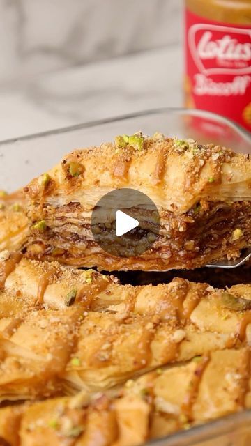 Rosie Brown on Instagram: "Biscoff Baklava 🤎

Flaky, crispy and tender, this baklava has layers of buttery pastry with crushed biscoff biscuits and nuts soaked in a delicious honey syrup. It’s perfectly sweet with just the right amount of spice, and the best part is , it’s super simple to make. 

#recipe 

40 sheets of ready rolled filo pastry sheets 
200g unsalted butter, melted (dairy free or dairy) 
200g crushed mixed nuts (pistachios, almonds, walnuts, pecans) 
200g crushed biscoff biscuits  2 tsp cinnamon 
 Syrup 
200 g granulated sugar
2 Tbsp lemon juice 
180ml water 
170ml honey or syrup (maple or agave) 

++ Melted biscoff spread and crushed biscuits/nuts for serving 

Start by making the syrup. 
In a saucepan combine the ingredients. Bring to a boil, stirring until the sugar is d Biscoff Baklava, Biscoff Biscuits, Biscoff Spread, Cinnamon Syrup, Vegan Holiday, Filo Pastry, Vegan Holidays, Honey Syrup, Pastry Sheets