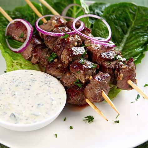 Lamb Souvlaki with Yogurt-Garlic Sauce Souvlaki Sauce, Lamb Souvlaki Recipe, Lamb Souvlaki, Souvlaki Recipe, Cucumber Sauce, Lamb Kebabs, Garlic Sauce Recipe, Marinated Lamb, Lamb Skewers