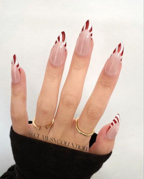 Yoko • ClawsxCollxtion on Instagram: "it’s almost that time of year right? 。 @apresnailofficial Medium Stiletto @amazon reflective gel (Amazon Storefront) @kiaraskynails Blank Canvas Art Gel code CLAWS10 for 10% off 。 。 。 #nailart #candycanenails #nailinspo #christmasnails #simplenails #explore #explorepage" Peppermint French Tip Nails, Candy Cane French Tips, Candy Cane Stripe Nails, Nails Christmas French Tips, Red French Christmas Nails, Candy Cane French Tip Nails, Reflective Gel Nails, Holiday Nails French, Gel Nails Stiletto