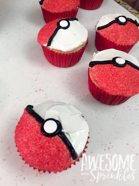 Poké Ball Cupcakes - Awesome with Sprinkles Pokemon Ball Cupcakes, Pokemon Birthday Party Cupcakes, Pokemon Birthday Cupcake Cake, Poke Ball Cupcakes, Diy Pokemon Cupcakes, Pokémon Birthday Food, Pokémon Birthday Cupcakes, Pokemon Cupcakes Ideas, Pokemon Dessert Ideas