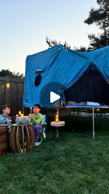 Tara DeFrancesco on Instagram: "Core Memory Made✨

Today we surprised the boys with a backyard camping set up using a trampoline tent!
With holiday lights & cozy bedding, the inside felt magical! We enjoyed s’mores over our @luxuryfirecanada fire bowl & made a core memory✨

Follow @tara_defrancesco for more of life with 3 boys.

#corememory #momlife #campinglife #glamping #lifewithkids #summeradventure #summertime #lifewithboys #august" Trampoline Tent, Core Memory, Camping Set Up, Backyard Camping, Camping Set, 3 Boys, Fire Bowls, Cozy Bedding, Camping Life