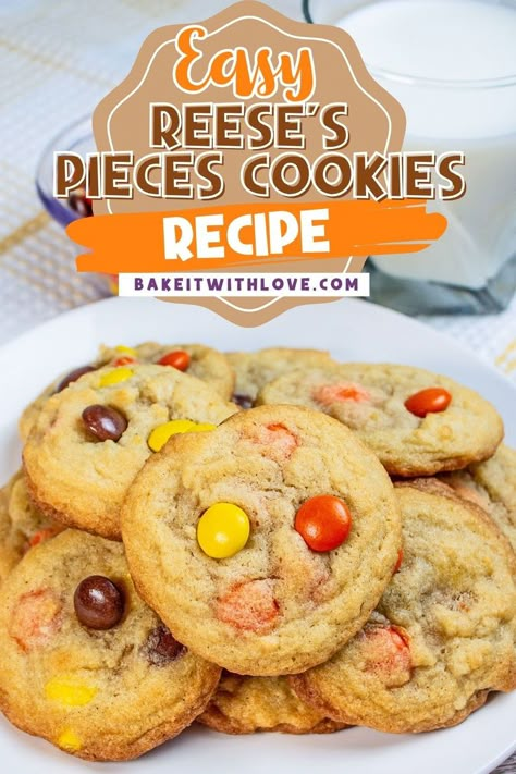 A pile of freshly baked Reese's Pieces cookies on a white plate. Reese Pieces Cookies, Reeses Pieces Dessert Recipes, Peanut Butter Chip Recipes, Reese's Pieces Cookies, Reeses Cookies, Meringue Pies, Walk Ideas, Butter Crunch, Peanut Butter Crunch