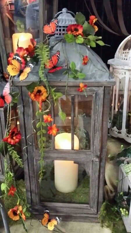 Cottage lantern accented with fern, pansey's and butterflies. ......by Twigs Spring Lantern Decor Ideas, Lantern Decor Spring, Spring Lantern Decor, Fairy Garden Lantern, Spring Lanterns, Lantern Decorations, Lantern Swags, Lantern Crafts, Spring Lantern