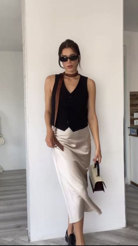 Ivory Satin Midi Skirt, How To Style A Silk Skirt For Summer, Silk Pencil Skirt Outfit, Silk Skirt Wedding Outfit, Black Slip Skirt Outfit Casual, Silver Slip Skirt Outfit, Khaki Satin Skirt Outfit, Green Satin Midi Skirt Outfit, Ivory Satin Skirt Outfit