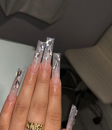 Silver Nails Ideas Long, Grey Nail Designs With Rhinestones, Blinged Out Silver Nails, Long Silver Nails Acrylic, Baddie Silver Nails, Boujie Nails Acrylic, Silver Nails Prom Acrylics, Grey Bling Acrylic Nails, Silver Glitter Nails With Rhinestones