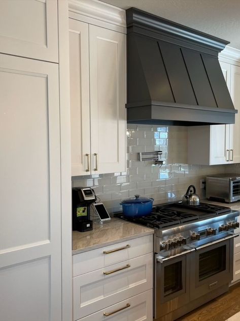 Designed by our designer Steve Norr White Wooden Hoods Over Stove, Modern Farmhouse Kitchen Range Hood, Oven Hoods Farmhouse Wood, Custom Stove Hoods, Black Vent Hood White Cabinets, Vent Hoods Over Stoves, Wood Kitchen Hood, Vent Hood Ideas, Range Hood Ideas