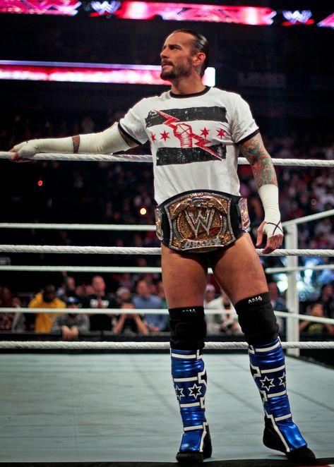 Former and best WWE champion ofall time CM Punk Best Wwe Wrestlers, Punk Top, Punk Poster, World Heavyweight Championship, Wwe Wallpapers, Pro Wrestler, Wrestling Superstars, Wwe Champions, Wrestling Wwe