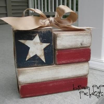 Red white and blue flag blocks for a table decoration or crafty house decor... cute and easy 2x4 Crafts, Wood Block Crafts, Independance Day, Wood Flag, Brown Paper Packages, Block Craft, Patriotic Crafts, 4th Of July Decorations, Patriotic Holidays