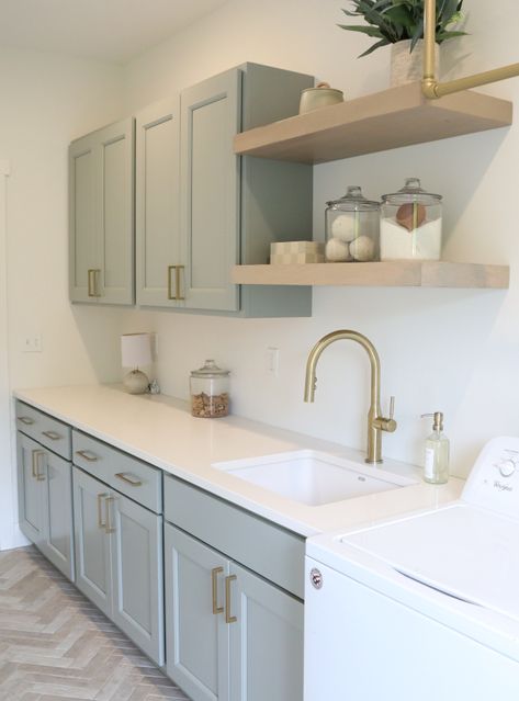 Fun Color Laundry Room, Sherwin Williams Laundry Room Cabinets, Laundry Room Design Flooring, Light Gray Laundry Room Cabinets, Gray Cabinet Laundry Room, Pale Green Laundry Room, Seasalt Sw Laundry Room, Popular Laundry Room Cabinet Colors, Rainwashed Sherwin Williams Kitchen Cabinets