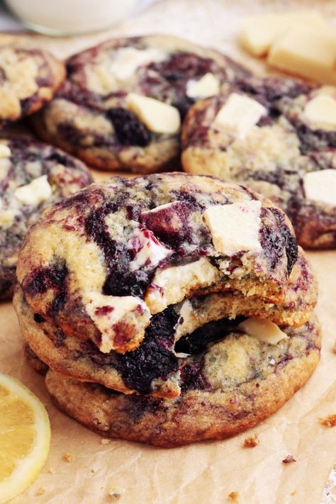 This might be the cookie recipe of the year! When I made these Lemon Blueberry Cookies, I immediately fell in love. I didn’t think I could ever love a cookie that doesn’t have dark chocolate in it this much! They have a soft chewy texture and bold buttery lemon flavour with swirls of sweet/tart blueberry and creamy morsels of white chocolate. Lemon Blueberry White Chocolate Cookies, Blueberry Chocolate Chip Cookies, Blueberry White Chocolate Chip Cookies, 2024 Cookies, Best Flourless Chocolate Cake, Scientifically Sweet, Lemon Blueberry Cookies, Cookies With White Chocolate, Berry Cookies