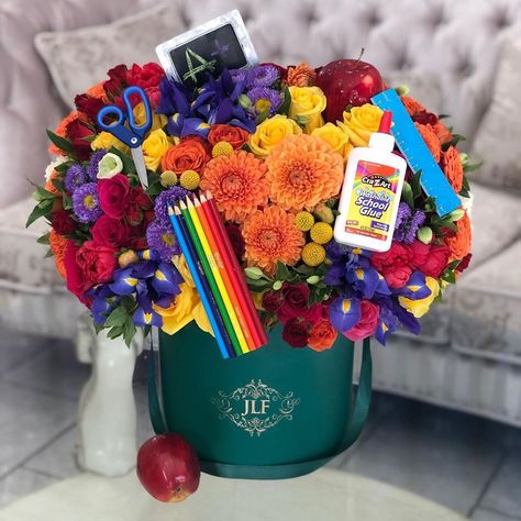 Our designers are so visionary! Start the school year off  with colorful blooms for students and teachers alike or any type of back-to-… 1 September School Decor, Back To School Bouquet, Teacher Bouquet, Handmade Teacher Gifts, Start Of Something New, Graduation Bouquet, Sweet Bouquet, School Celebration, Flower Boutique