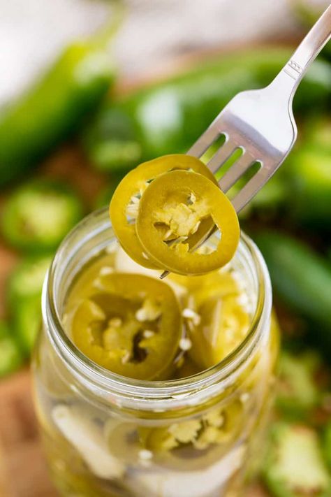 Pickled jalapenos are super easy to make and they go great on burgers and sandwiches, and in salads and tacos. You'll always want a jar in your fridge! Quick Pickled Jalapenos, Pickled Items, Pickled Jalapeno Recipe, Pickled Sweet Peppers, Condiments Recipes, Relish Sauce, Pickled Jalapenos, Stay At Home Chef, Canning Pickles