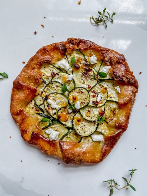 Zucchini & Goat Cheese Galette with Hot Honey & Thyme — All Types Of Bowls Zucchini Galette, Goat Cheese Galette, Zucchini Goat Cheese, Types Of Bowls, Spicy Zucchini, Cheese Galette, Vegan Diner, 2 Ingredient Dough, Goat Cheese Tart