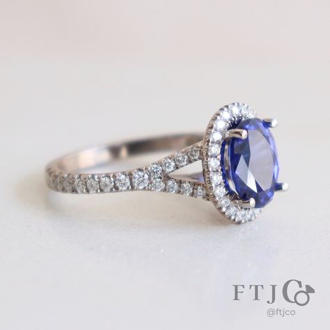 More is definitely more for this Princess Diana-inspired split shank sapphire halo ring. Not only does it feature a *large* blue oval sapphire (almost 2.5 ct), the halo and split shank are also encrusted with diamond pavé. It's a classic combo, taken to the max. 💎💙✨ . This is a Custom Oval Halo with a Diamond Pavé Split Shank made in our 18K AKARA People + Planet palladium white gold. It's set with a 2.48 ct Medium Blue Oval Mixed Cut Chatham lab grown sapphire, with twenty-two 1.2 mm SCS Cer... Sapphire Halo Ring, Split Shank, Halo Ring, Halo Rings, Princess Diana, Medium Blue, Pave Diamonds, Lab Grown, Halo