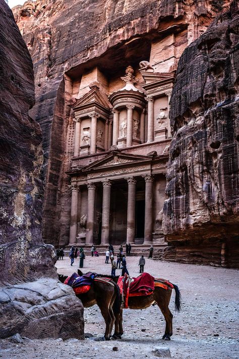 Al-Khazneh ("The Treasury") is one of the most elaborate temples in Petra, a city of the Nabatean Kingdom inhabited by the Arabs in ancient times. As with most of the other buildings in this ancient town, including the Monastery (Arabic: Ad Deir), this structure was carved out of a sandstone rock face.The structure is believed to have been the mausoleum of the Nabatean King Aretas IV in the 1st century AD. Jordan. Sandstone Rock, Rock Face, 1st Century, Ancient Architecture, Ancient Times, Dream Destinations, Archaeology, Vision Board, Jordan