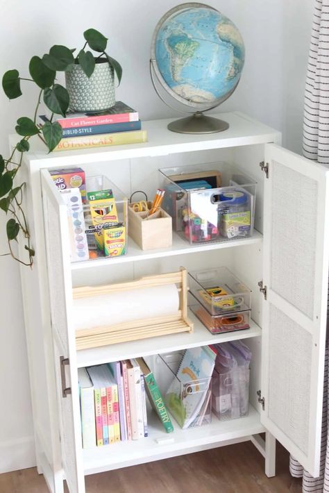 Small Home School Space, Toy Cabinet Organization, Desk Cabinet Organization, Homeschool Storage Cabinet, Small Homeschool Space, Organize School Supplies At Home, Homeschool Organization Storage, Homeschool Cabinet, Homeschool Closet