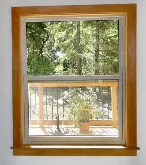 Wood color too dark but white window trim. Window matches wall and trim could have nice “framed” look Vinyl Windows With Wood Trim, White Vinyl Windows With Wood Trim, Pine Window Trim Interiors, White Vinyl Windows, Alder Trim, Diy Windows, White Window Trim, Craftsman Window, Vinyl Window Trim