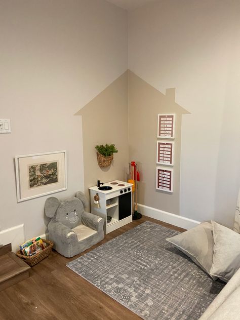 Playroom Space In Living Room, Tiny Play Corner In Living Room, Play Area Corner In Living Room, Play Corners In Living Room, Play Zone In Living Room, Playroom Home Corner, Painted House On Wall Playroom, Kid Play Corner In Living Room, Small Corner Play Area