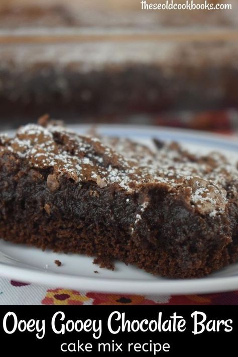 Chocolate Cake Mix Gooey Bars are a chocolate-lovers delight. This six ingredient cake mix recipe has a brownie bottom with an ooey gooey fudge layer on top. Chocolate Cake Mix Gooey Bars Recipe - These Old Cookbooks Cake Mix Gooey Bars, Gooey Bars Recipe, Pistachio Coffee Cake, Butter Cake Bars, Cake Mix Cinnamon Rolls, Chocolate Bar Cakes, Stuffed Pepper Recipe, Cake Mix Bars, Gooey Chocolate Cake