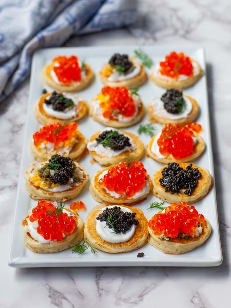 Easy Blini with Caviar (video) - Tatyanas Everyday Food Wine And Appetizers, Scallops And Caviar, Shrimp Hors D’oeuvres, Blini Caviar, Caviar Service, Blini Recipe, Hors Devours Appetizers, Fancy Plates, Caviar Appetizers