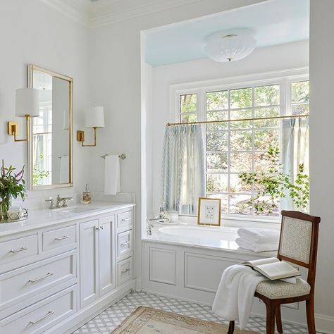 Birmingham Home & Garden (@birminghamhomeandgarden) • Instagram photos and videos Tub In Front Of Window, Built In Tub Master Bath, Bathroom Counter Decor, Bubble Baths, Brass Sconces, Pretty Bathrooms, Cottage Bathroom, Schumacher Fabric, Tile Floors