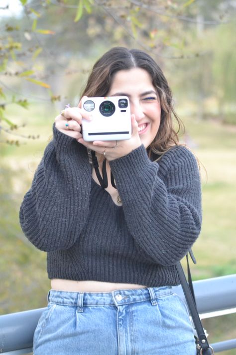 Girl taking a Polaroid picture Taking Polaroid Pictures, Picture Polaroid, Polaroid Picture, Portrait Pictures, Polaroid Pictures, 2025 Vision, Senior Pics, Senior Pictures, Drawing Reference