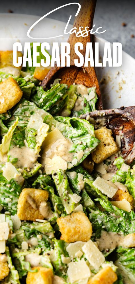 A close up view of a bowl of caesar salad with wooden spoons peaking out for serving. Best Caesar Salad Recipe, Chicken Cesear Salad Dinner, Ceaser Salad Ideas, Best Ceasar Salad, Caesar Chicken Salad, Best Caesar Salad, Homemade Caesar Salad, Chicken Caesar Salad Recipe, Salads For A Crowd