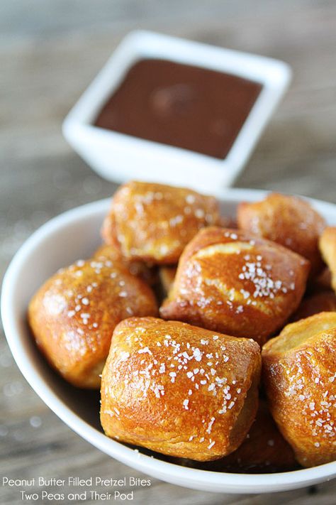 Homemade Pretzel Bites filled with peanut butter and dipped in chocolate-recipe on www.twopeasandtheirpod.com Homemade Soft Pretzel Bites, Homemade Pretzel Bites, Two Peas And Their Pod, Pretzel Bites Recipe, Peanut Butter Pretzel Bites, Homemade Pretzel, Soft Pretzel Bites, Pretzel Bites Recipes, Peanut Butter Filled Pretzels