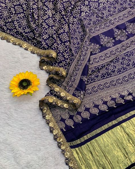 EXQUISITE AJRAKH SAREE ALERT! Be the epitome of elegance in our stunning Ajrak Gajji Silk Saree! Print and hand block print designs that blend tradition with modernity Exclusive fancy sarees that are truly fit for royalty #AjrakGajjiSilkSaree #PrintAndHandBlockPrint #FancyJariChevronPallu #ExclusiveFancySarees #SareeLove #IndianFashion #HandloomSaree #TraditionalMeetsModern #FashionReels #StyleArray #WomenClothing #NewArrivals #MustHave #SareeGoals #DressToImpress #ViralVibes #TrendingNow Ajrak Saree, Gajji Silk Saree, Block Print Designs, Ajrakh Sarees, Glamorous Saree, Designer Sarees Collection, Sarees Collection, Hand Block Print, Fancy Sarees