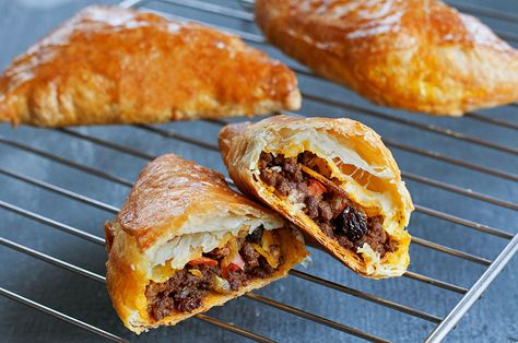 These individual curried lamb hand pies are easy to throw together for a fun weeknight dinner. Curried Lamb, Baking Savory, Curry Lamb, Hand Pies Savory, Recipe Folder, Pies Recipes, Andrew Zimmern, Scottish Recipes, Hand Pie