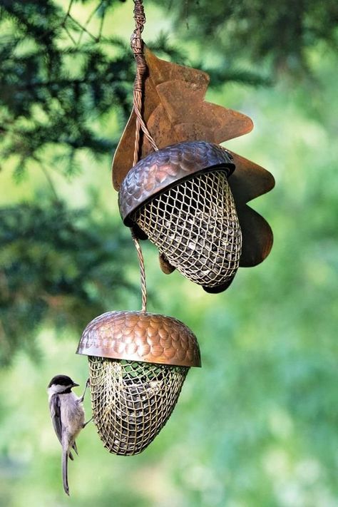 Attract some hungry feathered friends and possibly some giant killer squirrels to your backyard with these nature-inspired acorn bird feeders. Cerca Natural, Wild Bird Feeders, Diy Bird Feeder, Deco Nature, Geek Decor, Bird Gifts, Humming Bird Feeders, Bird Seed, Metal Leaves