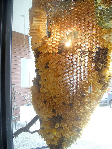 Anthropologie Window display. Paper Beehive Chandelier Chicken Wire Bee Hive, Anthropologie Crafts, Honeycomb Display, Chicken Wire Decor, Anthropologie Displays, Anthropologie Window Display, Anthropologie Display, Retail Windows, Window Displays