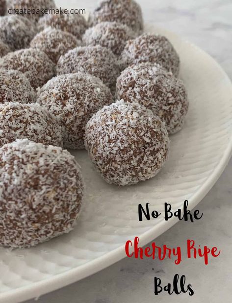 Cherry Ripe Balls on a plate Cherry Balls Christmas, Cherry Rum Balls Recipe, Cherry Protein Balls, Cherry Ripe Balls, Cherry Ripe Recipes, Xmas Nibbles, Christmas Sweets Easy, Cherry Balls, Christmas Smells