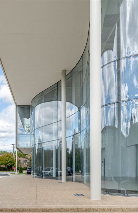 glass facade of a new theater building in Wilmette, IL Curtain Glass Wall Facade, Curved Glass Architecture, Curved Steel Structure, Curved Facade Design, Curved Glass Facade, Curved Building Facade, Glass Facade Architecture Design, Curved Facade Architecture, Curved Building Architecture