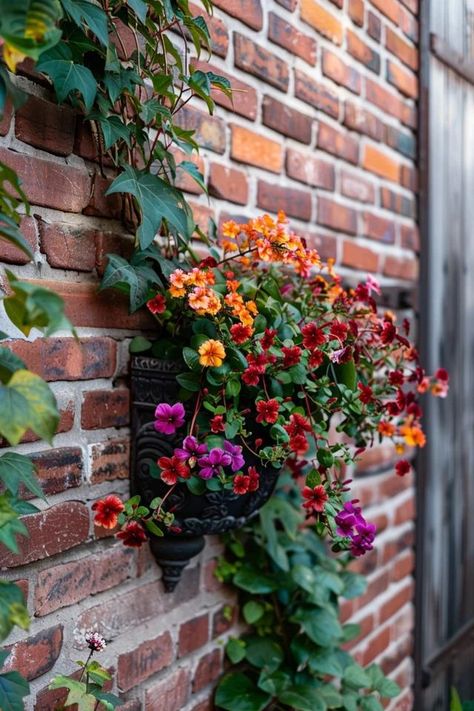 How To Decorate A Brick Wall Outside: Outdoor Style Long Exterior Wall Decorating Ideas, Patio Brick Wall Decor Ideas, Painting Brick Wall Backyard, Decorate Brick Wall Outdoor, Brick Wall Decor Outdoor, Brick Wall Outdoor Decor Garden Ideas, Outside Brick Wall Decor Ideas, Outdoor Wall Art Paintings, Brick Wall Outside