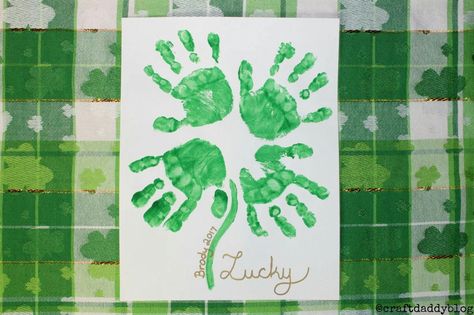 Quick and easy St. Patrick's Day four-leaf clover handprint painting. Clover Painting, Baby Footprint Crafts, St Patricks Baby, Clover Craft, Crafts With Kids, Saint Patricks Day Art, Baby Footprint Art, Nursery Crafts, March Crafts