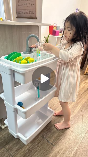 Roxan | Montessori Inspired | Toddler Activities on Instagram: "I’ve finally found a solution to the storage problem for the play sink. Such a game changer. Plus the tier cart is only $15!  Comment “CART” and I’ll dm you the link to our Tier Cart  #momhack #momhacks #toddlerhacks #everydayplayhacks #lifehacks  #lovevery #targetfinds #motherhoodunplugged #motherhoodthroughinstagram #toddleractivities #loveverytoys #targetmusthave #hacks #toddlertoys #practicallife #motherhoodsimplified #motherhoodinspired" Mala Easel Hack, Target Must Haves, Toddler Hacks, Play Hacks, Practical Life, Toddler Play, Mom Hacks, Kids Playroom, Game Changer