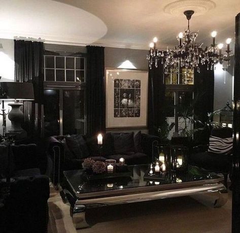 a modern Gothic glam living room with grey walls, black curtains and furniture, a crystal chandelier and candles Goth Living Room Ideas, Gothic Living Room Ideas, Modern Gothic Home Decor, Modern Gothic Home, Gothic Living Rooms, Goth Living Room, Gothic Living Room, Modern Glam Living Room, Halloween Living Room