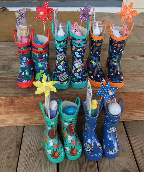 Rain Boots Easter basket Rain Boots Easter Basket Kids, Rainboot Easter Basket Ideas, Rain Boot Easter Basket Ideas, Rain Boots Easter Basket, Rain Boot Easter Basket, Occasions Bins, Easter Basket Gift Ideas, Basket Gift Ideas, Toddler Boy Easter